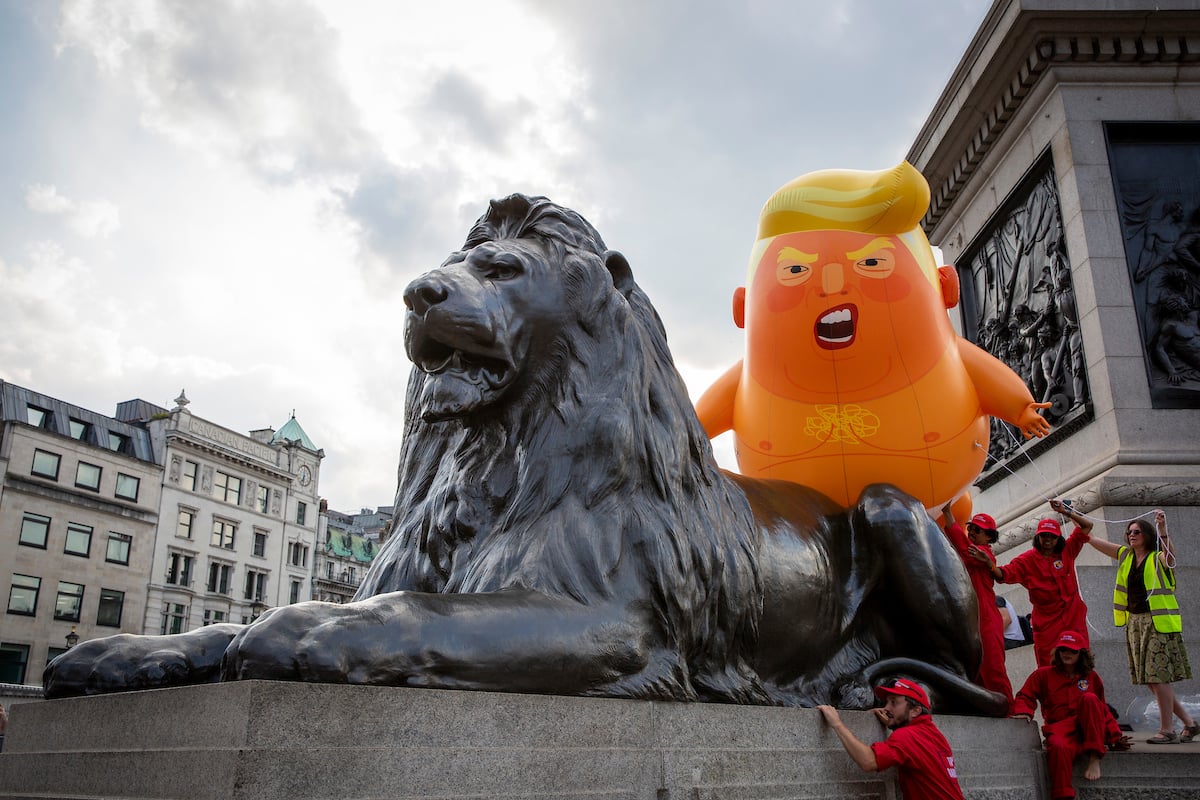 Mini Trump Baby joins the Women’s March Against Trump as it arrives in Parliament Square.